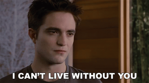 The image is from the Twilight series featuring Edward Cullen, played by Robert Pattinson. Edward is looking serious, and the caption reads, "I can't live without you," emphasizing his deep emotional connection and dependence on Bella, the main character.